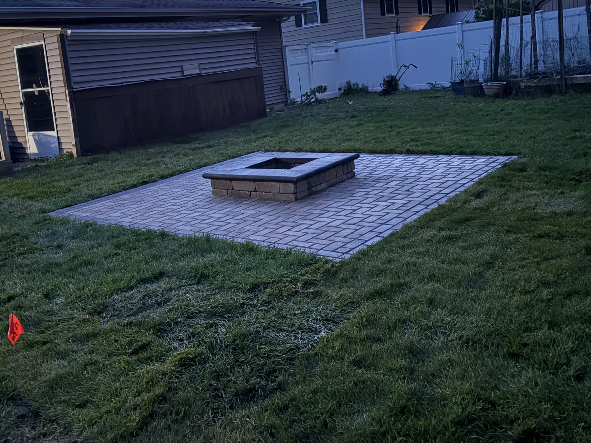 Gallery photos for Muddy Backyard Gets a Paver Patio and Fire Pit Upgrade: Image #1